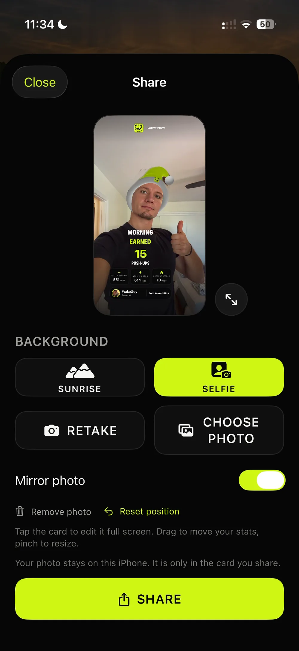 The Share Studio with a selfie background, and the Retake, Choose Photo and Mirror Photo controls