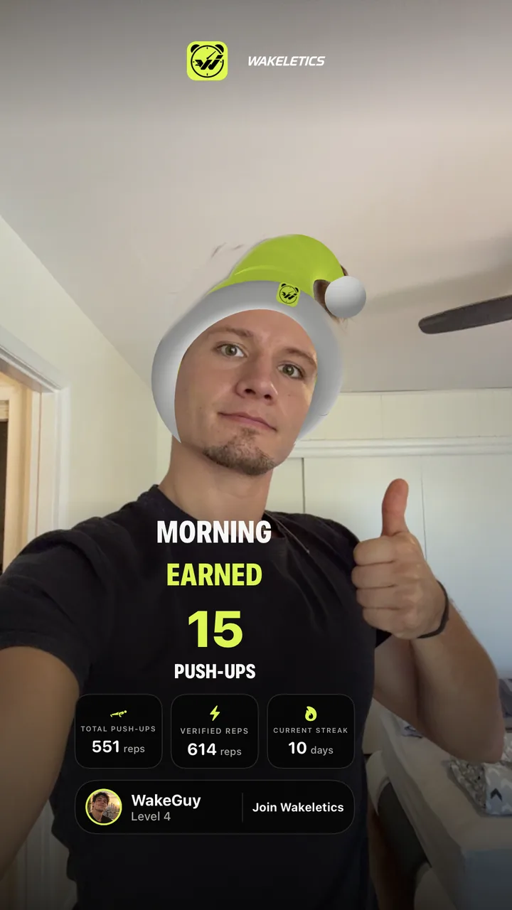 A finished Morning Earned card: a selfie in the Sleep Cap lens, 15 push-ups, and three stats